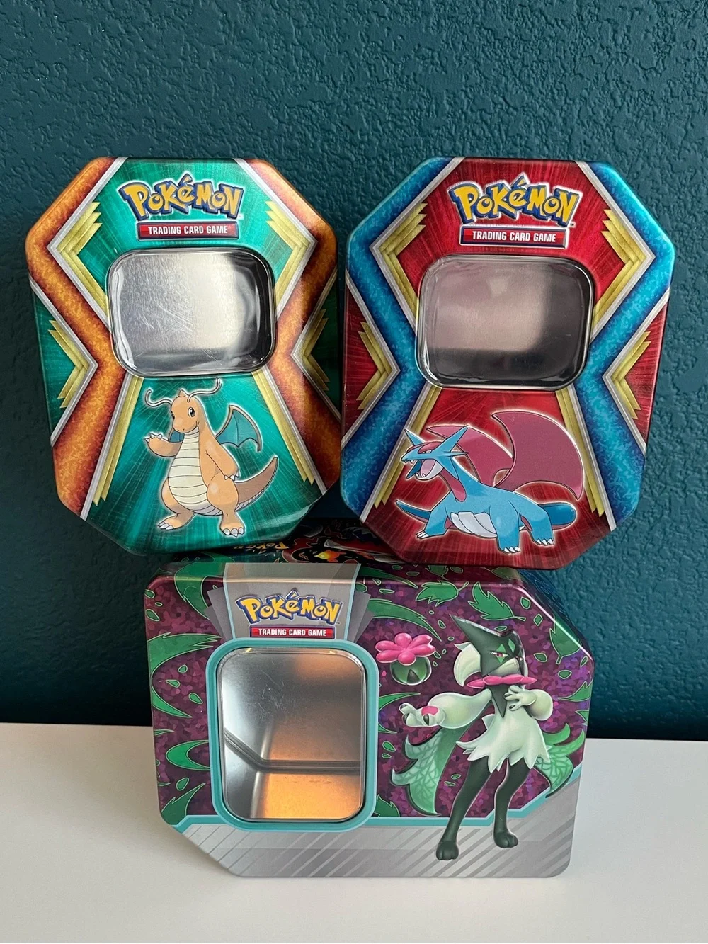 Pokemon TCG Trading Card Game Collectible Tins Dragonite, Salamence, and Meowsca